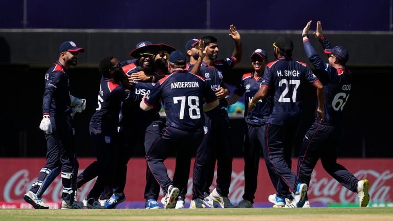 A photo of Team U.S.A. celebrating during a game in the T20 Cricket World Cup.