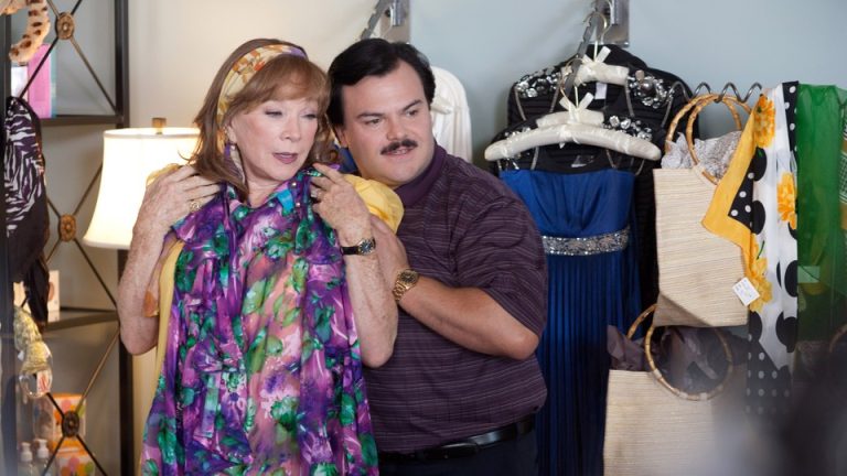 Jack Black and Shirley MacLaine looking at dresses