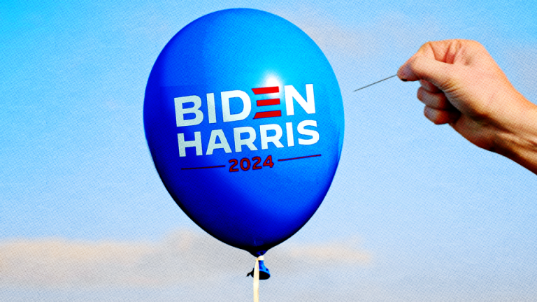 Hand with a needle about to puncture a "Biden Harris 2024" bubble