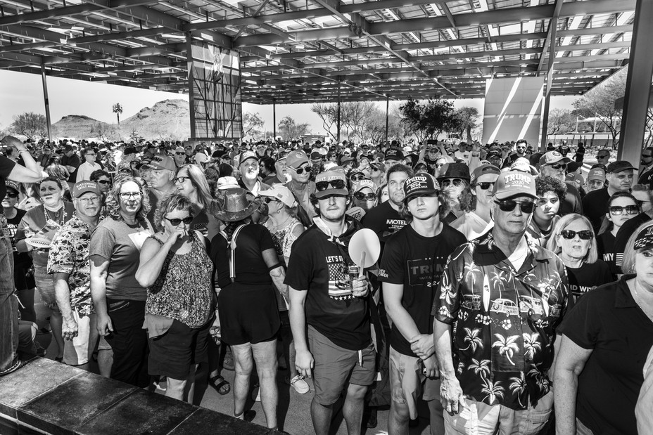 Picture of a crowd waiting in 110 degree heat to attend the Chase the Vote - A Town Hall with Special Guest President Donald J. Trump Sponsored by Turning Point PAC & Turning Point Action at Dream City Church on June 6, 2024 in Phoenix, Arizona.