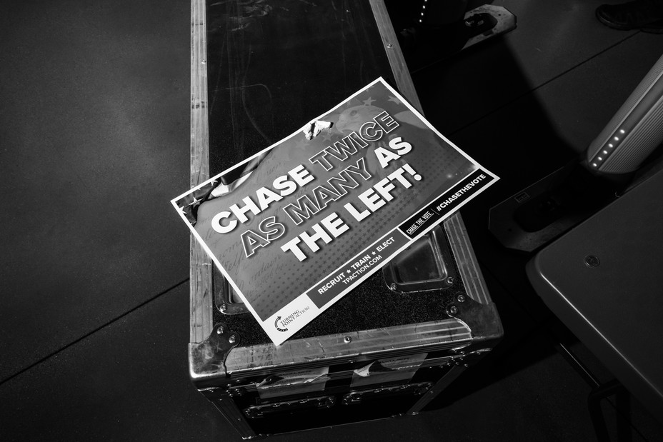 Picture of a sign that says "Chase Twice as Many as the Left" at the Chase the Vote - A Town Hall with Special Guest President Donald J. Trump Sponsored by Turning Point PAC & Turning Point Action at Dream City Church on June 6, 2024 in Phoenix, Arizona.