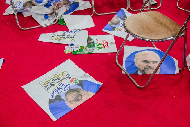 posters of Mohammad Bagher Qalibaf on the floor