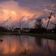 Storm clouds off the coast of Louisiana can be seen from Pointe-Aux-Chenes