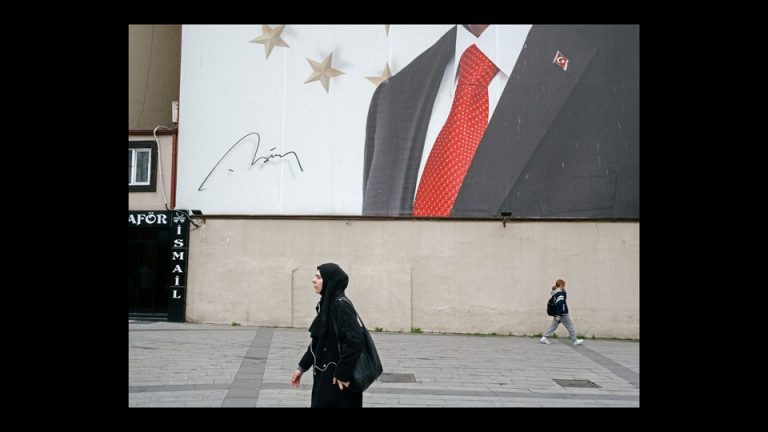 Woman in Burqa walking in street in Turkey