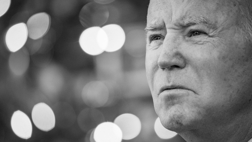 Biden, in grayscale, looking grave