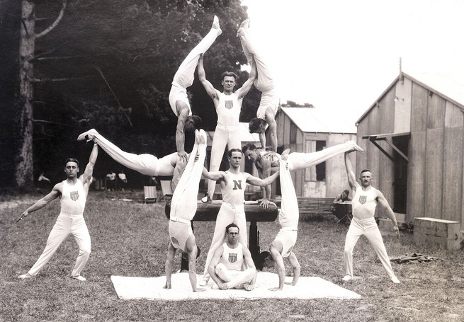 The U.S. Olympic gymnasts perform practice stunts at their Rocquencourt headquarters, in France.