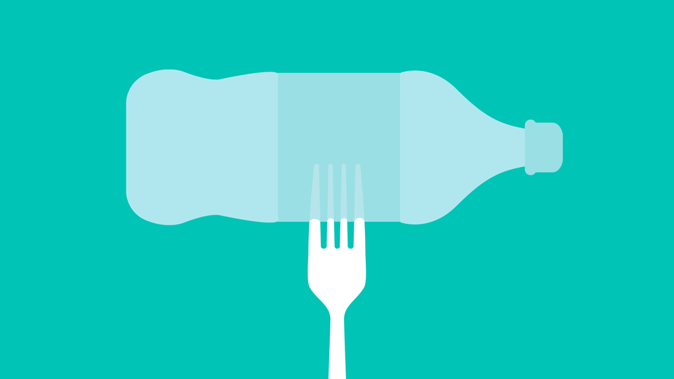 A fork and a water bottle against a teal background