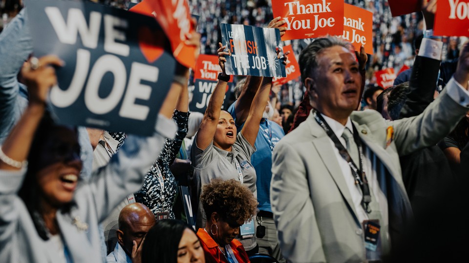 Delegates cheer for President Joe Biden at the DNC on August 19.