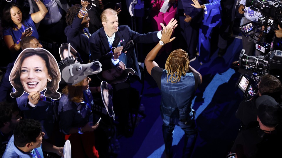 Lil Jon high fives somebody while performing at the DNC