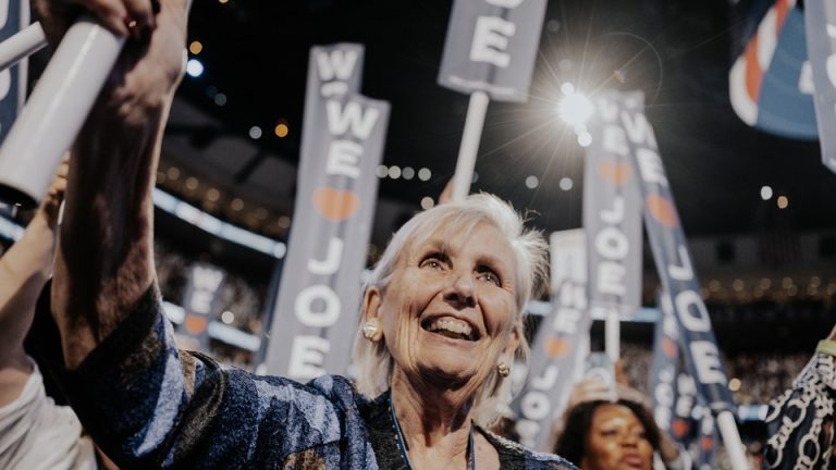 Elderly white woman looking ecstatic at Democratic National Convention