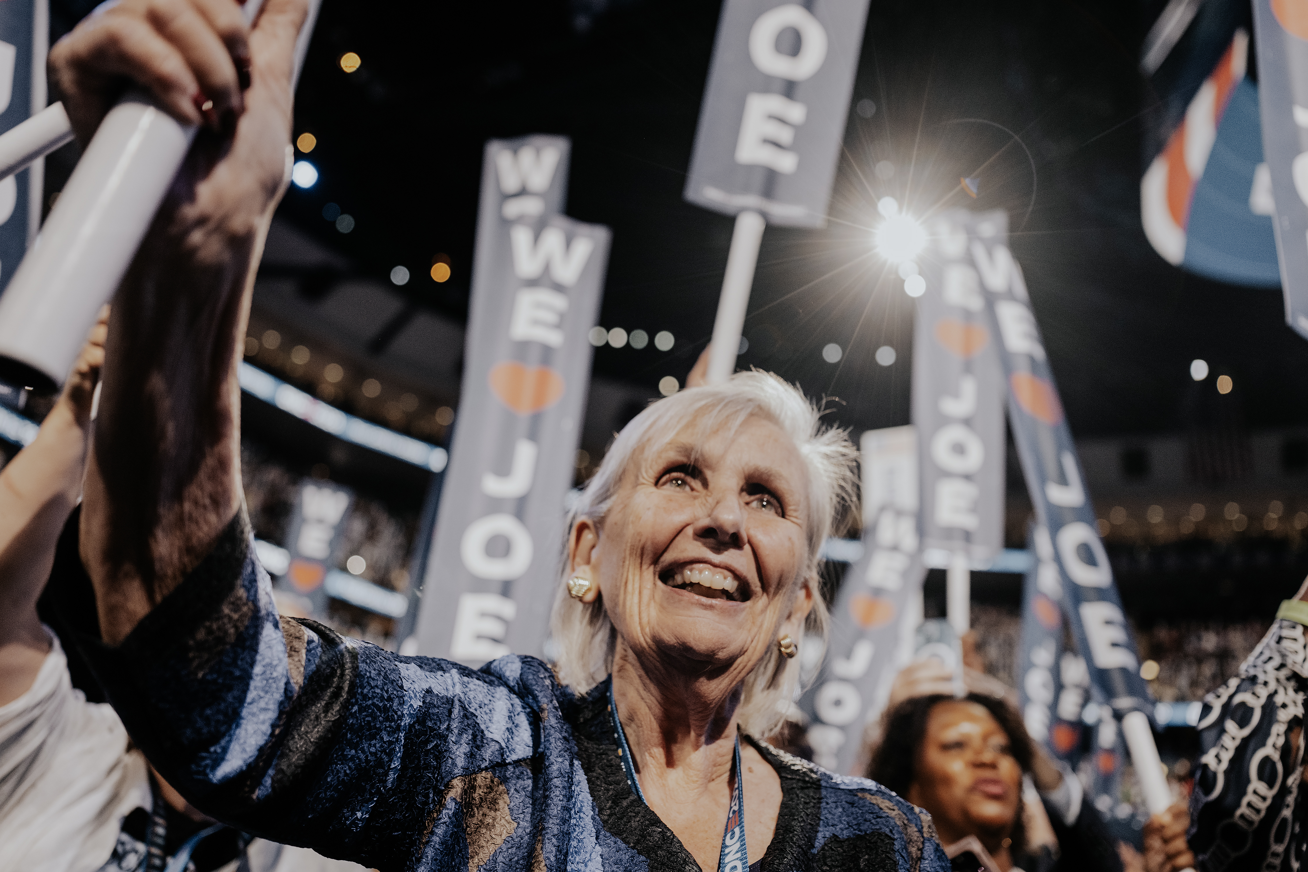 An elderly white woman looking ecstatic at the Democratic National Convention