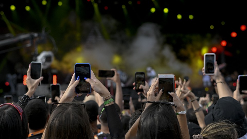 People holding phones