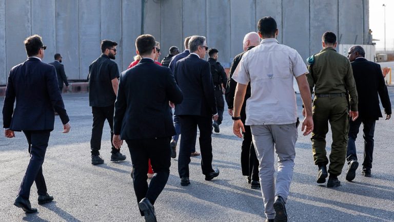 Antony Blinken walks with Israeli Defense Minister Yoav Gallant toward the Gaza border at the Kerem Shalom crossing