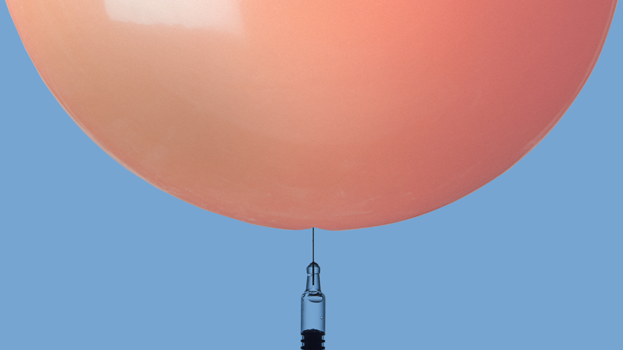 An illustration of a needle touching a balloon.