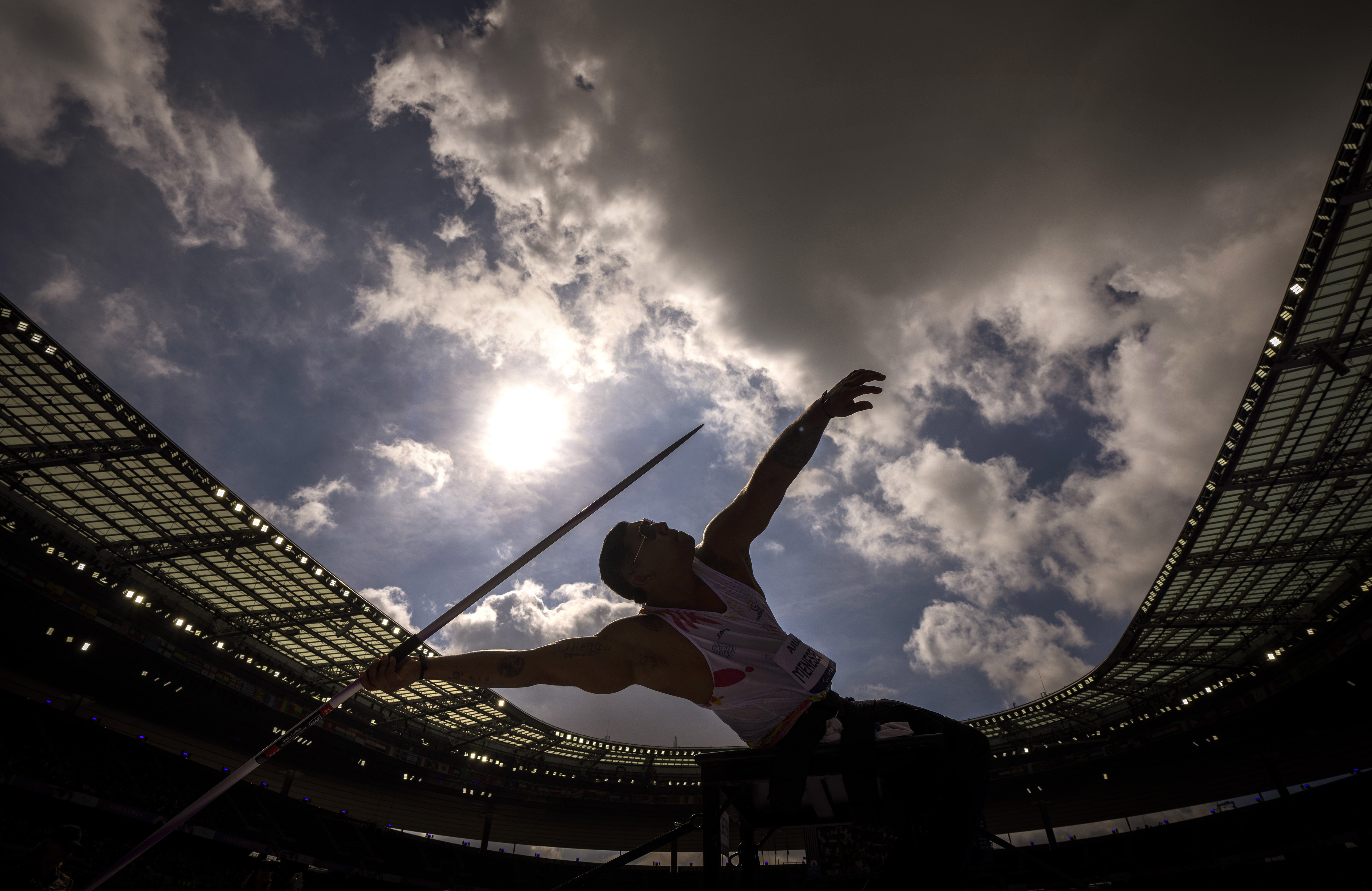 A Paralympian winds up a powerful javelin throw.