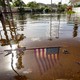 An American flag is submerged in floodwaters in Florida after Hurricane Helene swept over the southeastern United States.