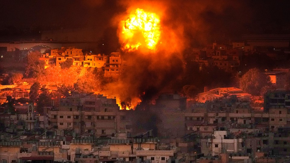 Flames rise after an Israeli air strike in the southern suburbs of Beirut on Saturday