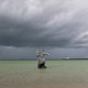 A sculpture of Poseidon stands in the ocean before the arrival of Hurricane Milton in Progreso, Yucatan state, Mexico.