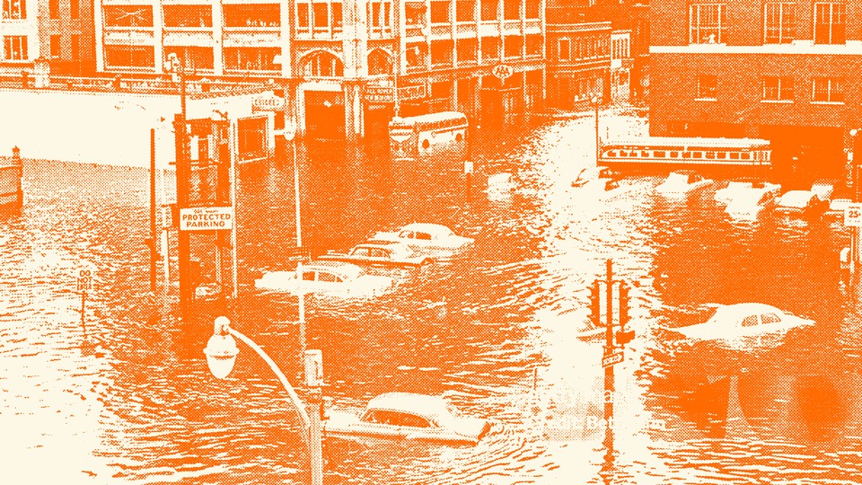 An orange-tinted image showing the flooded streets after Hurricane Helene struck