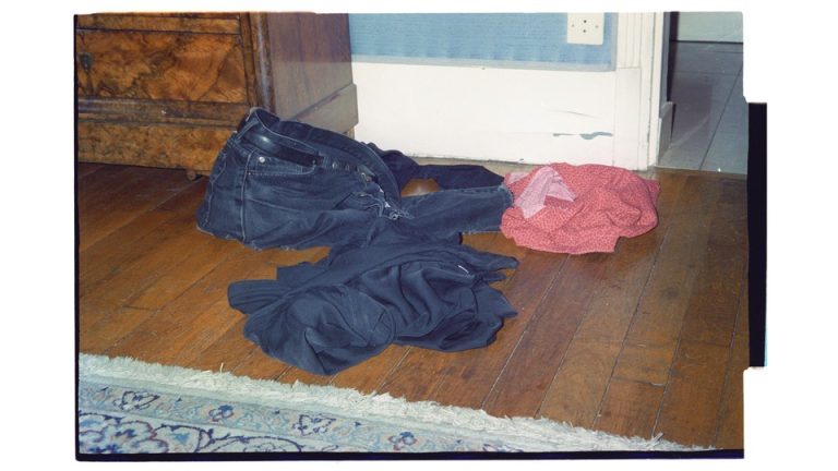 jeans and shirts crumpled on the floor