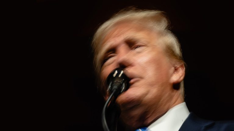 blurred photograph of Donald Trump's face