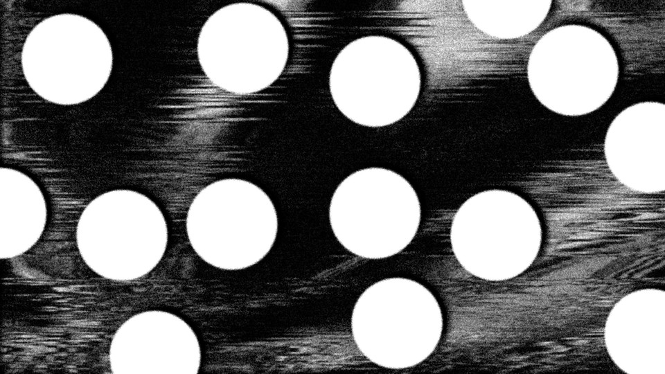 white pill-like circles against a black and white blurred image reminiscence of an ultrasound