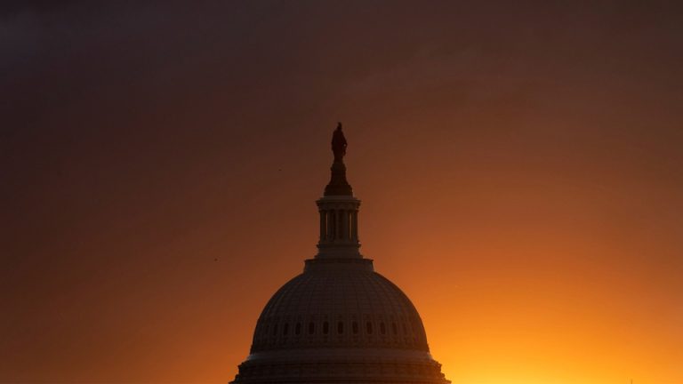 the sun setting or rising on the Capitol