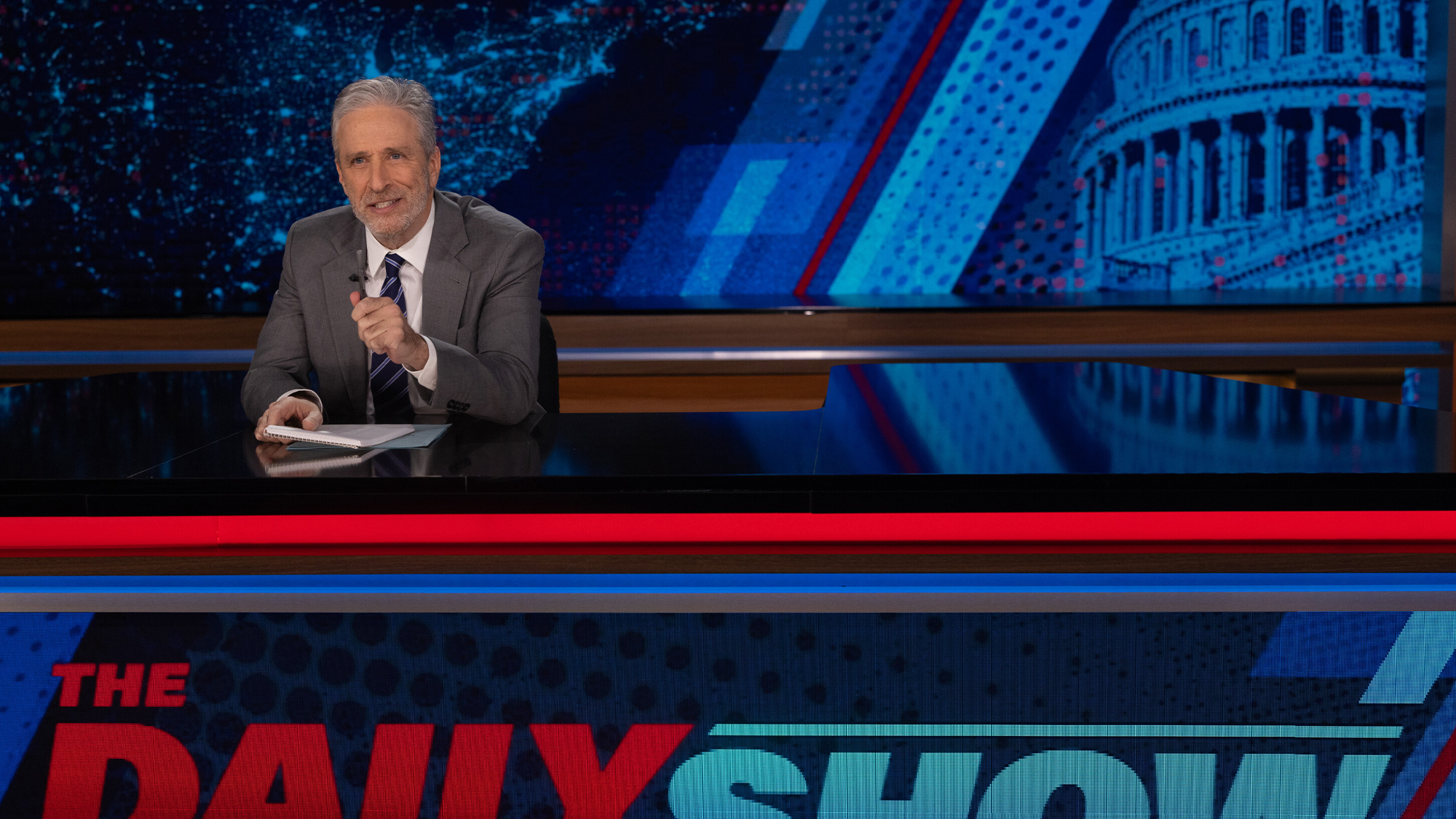 Jon Stewart speaks at The Daily Show desk