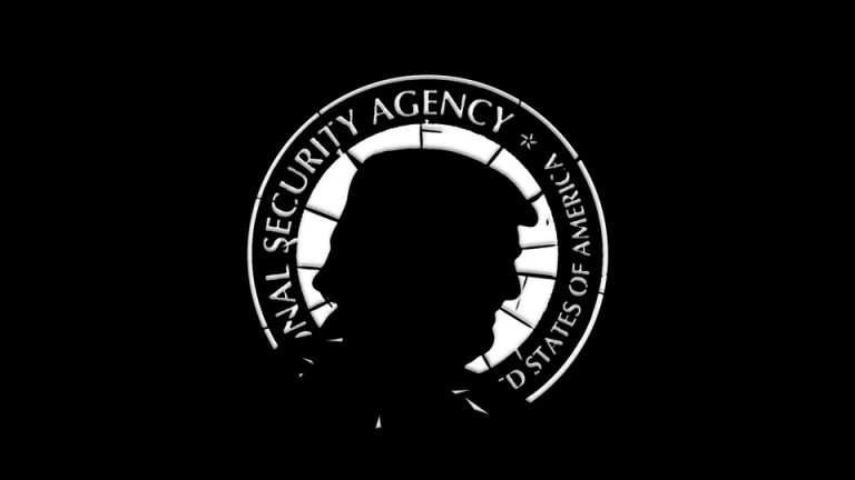 The badge of the National Security Agency with a silhouette of Donald Trump’s head in front of it