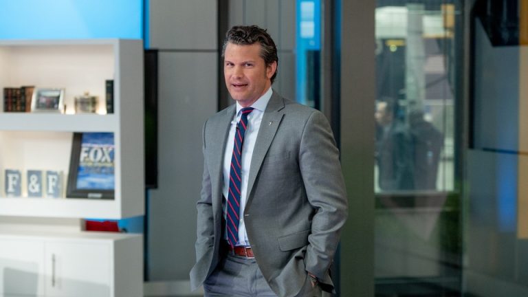 Pete Hegseth stands on the Fox News set