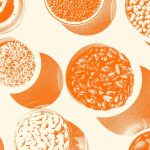 An orange-tinted image of multiple bowls of beans