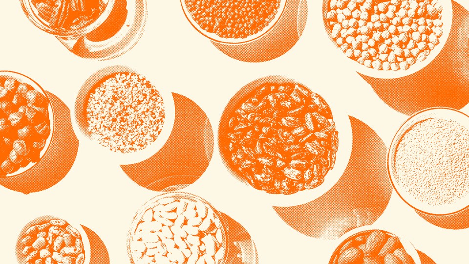 An orange-tinted image of multiple bowls of beans