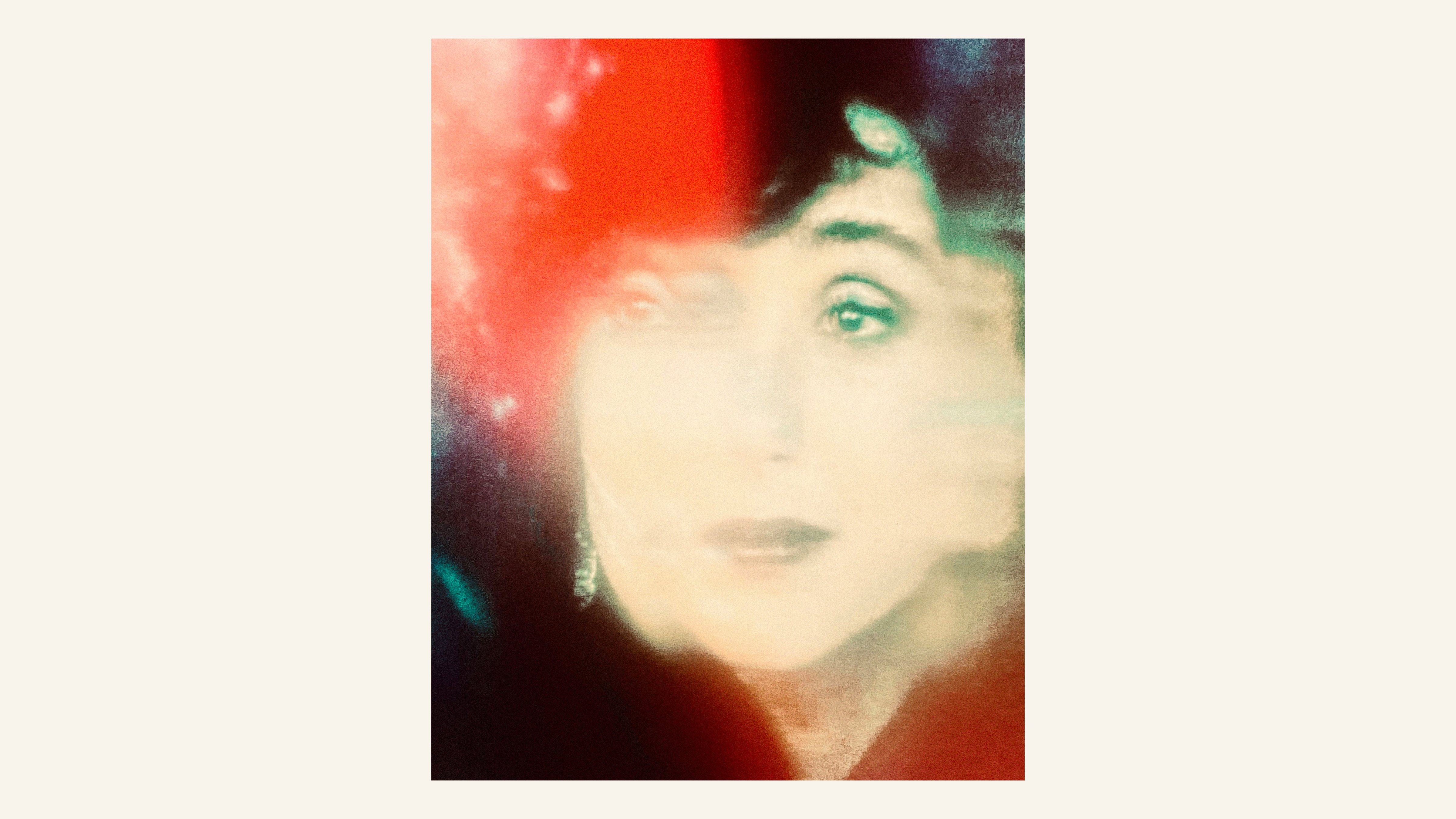 A colorful photograph of a projected image of Cher