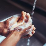 Man washing his hands