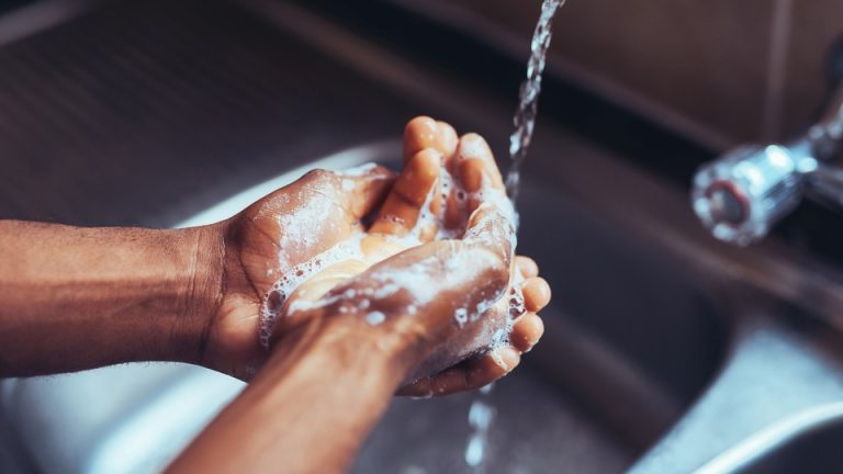 Man washing his hands