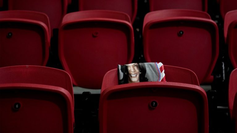 A shirt for Democratic presidential nomineeKamala Harris hangs on a seat before a campaign rally at the University of Nevada at Las Vegas