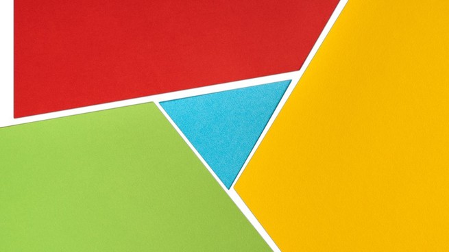 Interconnecting shapes in red, cyan, green, and yellow—Google's colors