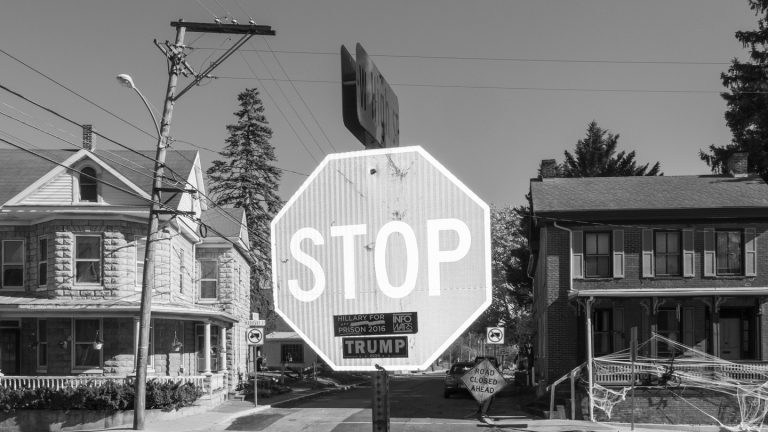 A stop sign with a Trump sticker in New Oxford, Pennsylvania