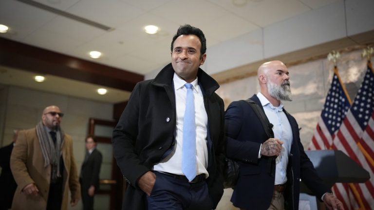 Vivek Ramaswamy smiles at the cameras as he arrives at the U.S. Capitol