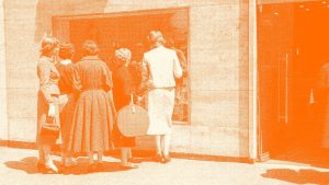 A vintage photo of women window shopping at a store