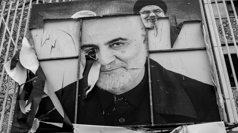 A broken picture of Iranian Gen. Qassem Soleimani