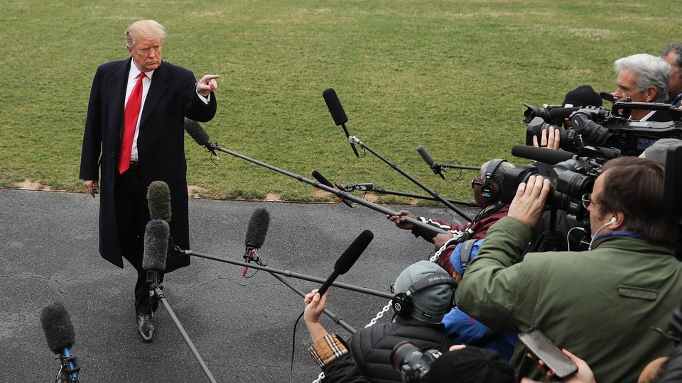 Donald Trump addresses a media scrum