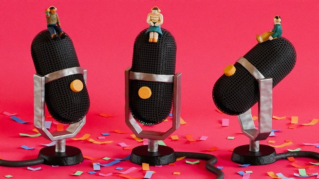 Podcast microphones with little people atop them