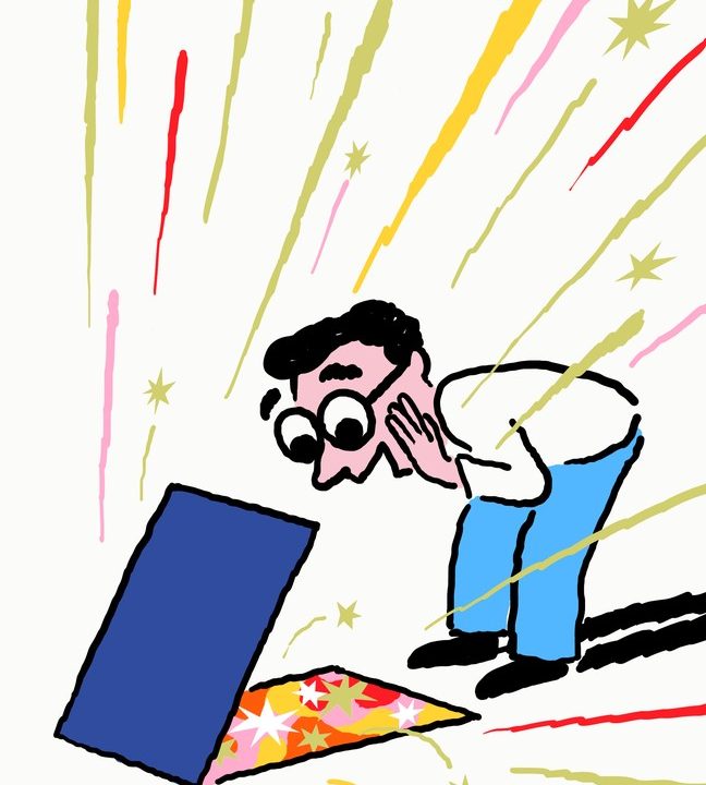 A man looks into a blue box of colorful stars, which explode outward.